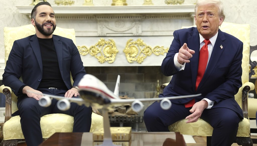 President Donald Trump speaks during a meeting with El Salvador's President Nayib Bukele, left, in the Oval Office of the White House in Washington, April 14, 2025. (Pool via AP)